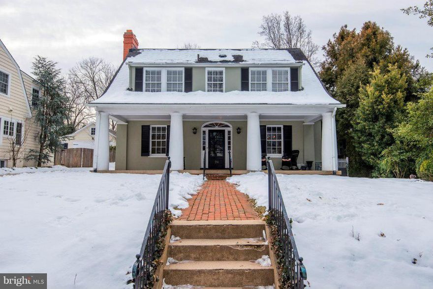 Stunning expansion/renovation of this utterly charming home on desirable block.  Welcoming front porch, formal entertaining spaces, ultimate gourmet kitch opens to breakfast rm and family rm, first floor den.Master Suite w/ French doors to private deck, walk-in closet, luxury bath, 3 additional bedrooms, upstairs den & laundry, 2 full hall baths.  Lower lvl features 5th BR, Fam Rm & rec rm.