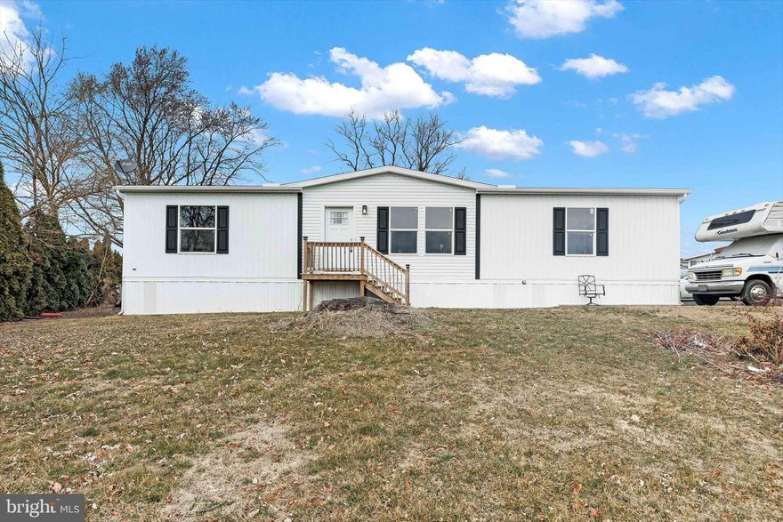 Welcome home to this 3-bedroom, 2 full bathroom double wide that was recently built in 2023! Located in Eastern Lancaster County School District, this home has a nice open layout, modern kitchen, and a primary bedroom which includes a private bathroom plus central air.  Ground Rent includes water and sewer. Easy access to route 322 with easy access to Ephrata and Lancaster. Do not wait for this one and schedule your showing today! MOTIVATED SELLER, BRING ALL OFFERS!! SOLD AS-IS.