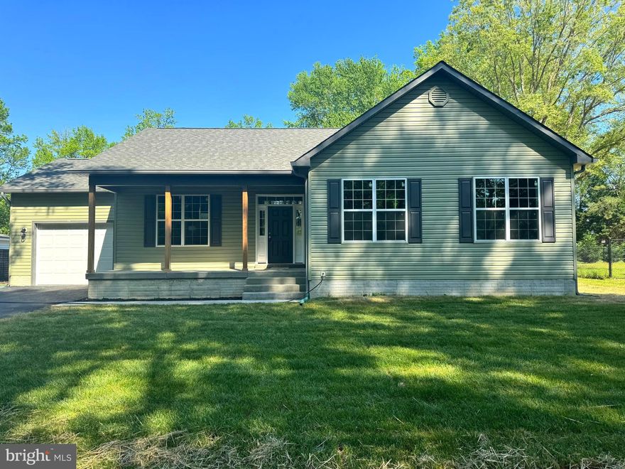 Welcome to 29756 Wilson Road, a rare opportunity to own a new construction home in the water-oriented community of Golden Beach! This beautiful home boasts a spacious low-maintenance concrete front porch, a conditioned crawlspace, and a sprawling flat back yard, ideal for outdoor relaxation. Inside, the open-concept floorplan features 9 foot ceilings, and seamlessly integrates a gorgeous kitchen with ample cabinet space, granite countertops, soft-close cabinets and drawers, a pantry, stainless steel appliances, and an eat-in island. The primary suite is separate from the secondary bedrooms for added privacy, and features a large bedroom with a ceiling fan, a huge walk-in closet with built-in shelves, and an en-suite bathroom with a dual vanity and a tiled walk-in shower. Down the hall there are two additional generous-sized bedrooms with carpeted floors and ceiling fans, and a second full bathroom featuring a dual vanity, built-in linen shelves, and a shower/tub combination surrounded by beautiful tile. With easy access to route 5, this home is in a perfect location for commuting to Andrews, Pax, DC, or NoVa. Enjoy all this amazing home has to offer in a community with access to beaches, boat ramps, piers, a playground, and community events throughout the year!