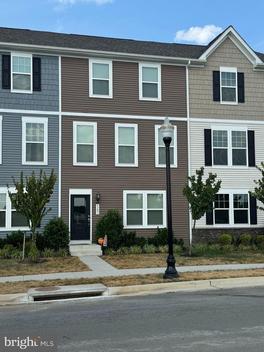 Like new town home in Jefferson County! This property is in a great commuter location to VA, MD or D.C. The lower level features a rear entry 3 car garage and a large rec room. Upstairs you have an open floor concept. This a great set up for entertaining. The large living room features carpet, large windows, and recessed lighting. The spacious kitchen features LVP floors, granite countertops and stainless-steel appliances. There is a large pantry for lots of extra storage. Beyond the kitchen you have a nice dining. The LVP carries into the dining space. There is a convenient powder room on this level as well. Upstairs you have a carpeted hall loft area leading to two generously sized bedrooms with carpet and ample closet space. The hall bath features easy-care vinyl floors, tub/shower combo, and single bowl vanity for extra storage. The primary suite features carpet flooring and a private ensuite. Your ensuite features easy-care vinyl floors, large walk-in shower with glass doors and single bowl vanity. Outside you have a large deck to enjoy the warmer months. Pets are case by case. This home has everything you're looking for in a great location! Call for more information today!
