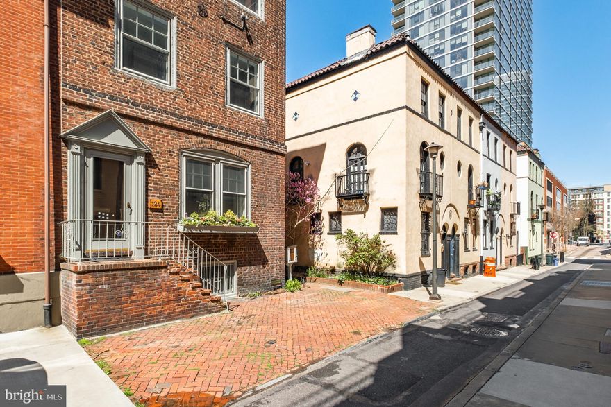 Welcome to 124 S Van Pelt Street, a stunning 4-bedroom, 2.5-bathroom urban oasis boasting a harmonious blend of historic charm and contemporary luxury.  Approximately 2,940 sq. ft. this home has been upgraded by the current owners, ensuring a seamless blend of style, comfort, and functionality.

The kitchen and dining room underwent a lavish remodel in 2020, featuring high-end appliances that elevate the culinary experience. Revel in the convenience of a Sub-zero fridge, Bosch oven & induction stovetop, and Miele dishwasher, all seamlessly integrated into the sleek, high-end cabinetry sourced from Wellborn. The refinished floor adds a touch of warmth and sophistication to the space, creating the perfect backdrop for culinary creations and memorable gatherings. Step outside through a set of extra-large French doors onto the charming outdoor patio, accessible from the kitchen and dining area, offering an idyllic setting for al fresco dining or morning coffee. Whether entertaining guests or enjoying a quiet moment of reflection, this outdoor retreat is sure to delight.

The living room, a focal point of the home showcases a working wood-burning fireplace, refinished floors, over 10 ft ceilings, and original pre-war crown molding details. A powder room and coat closet have been added for convenience and functionality, ensuring that every detail is thoughtfully curated for modern living.

The primary bedroom is on the second floor and offers a serene sanctuary and a newly renovated bath area with radiant heated floors, exquisite Castillo Matte White ceramic wall tiles, and double vanity sink. On the same level, you'll find yourself in the library or den space, with a wood burning fireplace and a beautiful wall of built-ins; an idyllic location for reading and relaxation. Venture up to the third floor, where three additional bedrooms await with extra storage space and a full bath.

The basement, newly finished, is depicted as a workout studio with wine storage, and laundry room. 124 S Van Pelt is ideally situated in the Fitler Square neighborhood; surrounded by the best restaurants, parks, and culture Center City can provide.