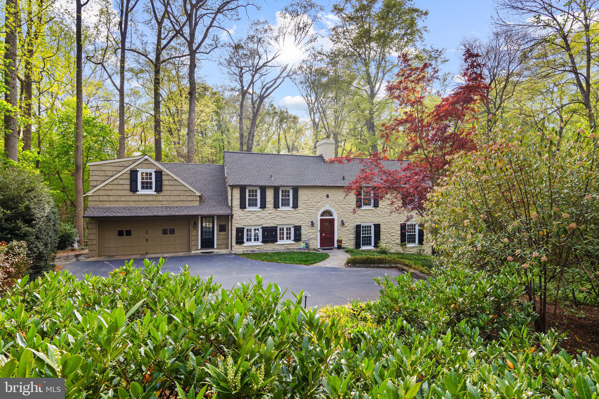 Welcome to 126 Anton Road in Wynnewood, a truly special property that is just minutes from the Ardmore SEPTA train station, Suburban Square, and restaurants in downtown Ardmore! Set on a very private 1.03-acre interior lot, this home has been completely renovated and updated, offering the perfect blend of modern style and peaceful living. You'll appreciate all the behind-the-scenes updates made by the current owners, including a new roof, new windows, new natural gas line, new gas furnace, new 2-zone A/C system, and new driveway. The designer Kitchen is a true showstopper, featuring tiger maple and honed granite counters, SubZero, an electric oven, and a gas cooktop with an exhaust hood. The Kitchen is open to the Dining Room, creating great space for cooking, entertaining, and gathering with friends and family. The large Living Room features a high ceilings, a wood-burning fireplace, and distinctive arched built-ins that are beautifully accented by the arched doorway entrances to the front hall and the Family Room. The sunny Family Room features walls of windows, another wood-burning fireplace, a door to the rear deck, and a wall of built-ins which includes a convenient desk/homework area. Nearby is a private Den/Study/Office with built-ins and a charming sliding door for privacy. The main floor Powder Room, Laundry Room, large Kitchen Pantry, and side entrances to the driveway and to the heated, attached 2-Car Garage complete the main floor.
Ascend the gracious 2-story staircase to the 2nd floor and you'll find a very private Primary Bedroom suite with two closets, windows on 3 elevations, and a totally renovated Primary Bathroom with heated floors and a gleaming glass-enclosed shower. Down the hall are two more Bedrooms which share a Jack 'n Jill renovated Bathroom with tub/shower combo. A door in the 3rd Bedroom provides access to the rear hallway, which leads to the 4th Bedroom. This area has two large hall closets and a convenient staircase to the main floor... making it ideal for use for guests, in-laws, or an au pair. Bedroom 4 has a very large walk-in closet as well as an en suite private 3rd full Bathroom. Downstairs, the finished lower level has a large Rec Room (currently used for exercise equipment) with a 3rd fireplace. There is also a large Bonus Room on this level (with a door to the side yard) and a utility room for mechanicals.
Fresh, clean finishes throughout the home make it feel truly move-in ready — all you have to do is unpack and enjoy. Outside, the living space expands even further. Step onto the expansive, low-maintenance composite deck, perfect for summer barbecues and evening relaxation. Enjoy the private jetted hot tub for a peaceful soak under the stars, or gather around a firepit on the stone patio — ideal for making memories year-round. The lot offers a rare sense of privacy and connection to nature, with sweeping wooded views and a level yard area for recreation or a playset. Located in highly-ranked Lower Merion School District, this home also offers easy access to Center City, the Airport, and corporate centers. Note that the Family Room and LL Rec Room may not be included in the interior sq. ft. Don’t miss the chance to call this beautiful property home! Showings start Thursday, May 1st.
