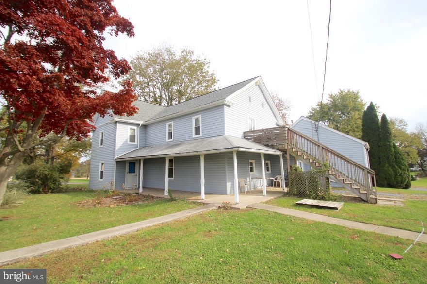 Great opportunity for an affordable 2 unit. Live in one and rent the other or rent both units out. Great for extended family arrangements too. You can live in the country and let your tenants help pay the mortgage. Home is redone with new windows, vinyl and updated baths. First floor offers 3 bedrooms and 2 full baths...perfect for those needing one floor living. ....fresh paint and flooring too. Upstairs is roomy with 2 Br and rented currently to offset the mortgage.  Easy access to rt 441 for commuting and all on a nearly 1 acre lot.Wildlife and sunsets are the view from the covered porch.Tenants pay their own heat and electric.Both units have their own laundry and all appliances included.Plenty of storage and ready to move right in and call this Ken your own!