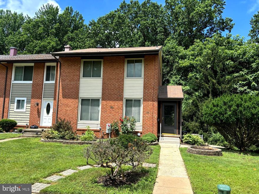 NEW PRICE!  Rarely available 3-4 bedroom, 2 full/2 half bath end-of-group townhome in Doncaster Village! This incredibly spacious home boasts a tastefully updated kitchen w/laminate flooring, quartz countertops, beautiful wood cabinets, GE profile stainless appliances.  The open floor plan features a dining room w/wood flooring, & huge light-filled sunken living room providing a tranquil view of trees & nature; & powder room.  All three upper-level bedrooms recently painted.  The primary bedroom will impress with your own personal "dry heat" Redwood Sauna (could be easily removed or converted to a cedar closet!), & private bath w/walk-in shower.  Two additional large bedrooms & bath.  Parquet flooring can be found under carpet on main & upper levels!  The delightful walk-out lower-level family room is perfect for relaxing & watching TV, or game night with family & friends.  An added bonus is another room that can easily be a 4th bedroom, office, or play room - use your imagination!  Large utility/storage room & powder room completes the lower-level.  The back patio is stunning with its landscaping &  very private tree-lined yard.  As if this isn't enough, just outside your front door there is a cozy screened-in porch overlooking the lovely side yard, & stairs to the back yard.   Walking distance to school.  Great location near restaurants & shopping.