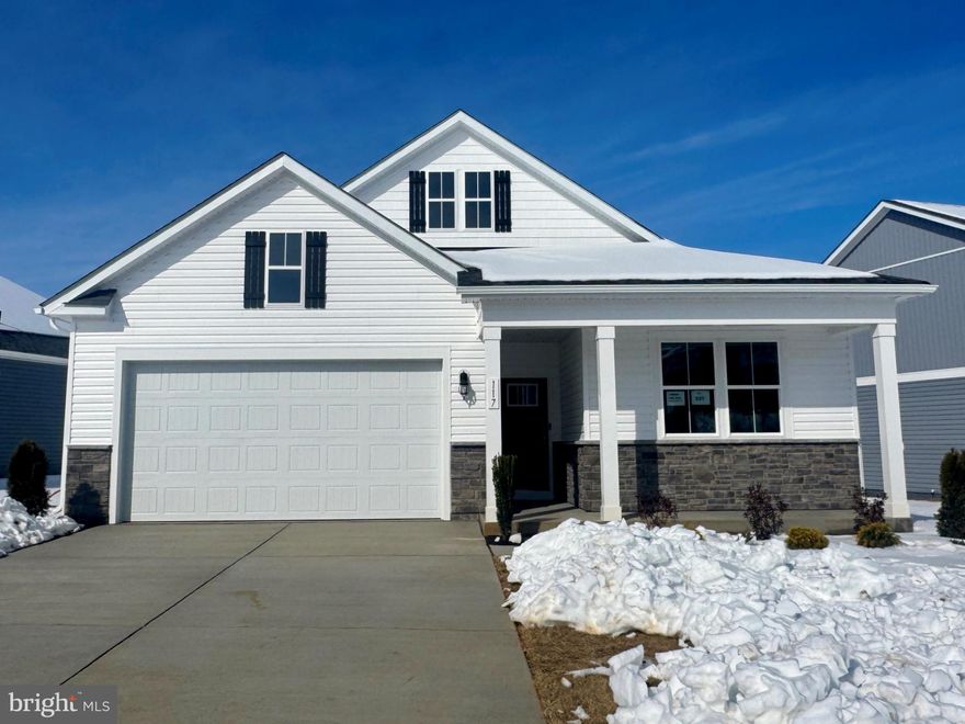 Experience effortless living in our Willow Run Active Adult community! Our Clifton floorplan is a thoughtfully designed 1,865 sq. ft. ranch home, blending style and functionality in a single-level open layout. The moment you step inside the home; you will be greeted by an inviting foyer leading you into the heart of the home. The kitchen opens to a large great room with two windows that let in natural light. The chef’s kitchen boasts stainless steel appliances, a pantry, and generous amount of cabinets and counter top space. From the great room, step through the sliding glass door to a covered porch, perfect for outdoor gatherings or morning coffee. The main level also features three generously sized bedrooms and two modern bathrooms - including a serene owner’s suite with dual vanities, a tiled walk-in shower, and two large walk-in closets. Need space for visiting friends or family? The finished basement offers an additional 1,000sq. ft. of a living space with a rec room, full bath, and bedroom – plus a large unfinished space for storage. Completed with a large laundry room, two-car garage, and a low-maintenance lifestyle, the Clifton offers comfort and convenience. Embrace one-story living and make The Clifton your perfect new home this Winter!
*Photos, 3D tours, and videos are representative of plan only and may vary as built.