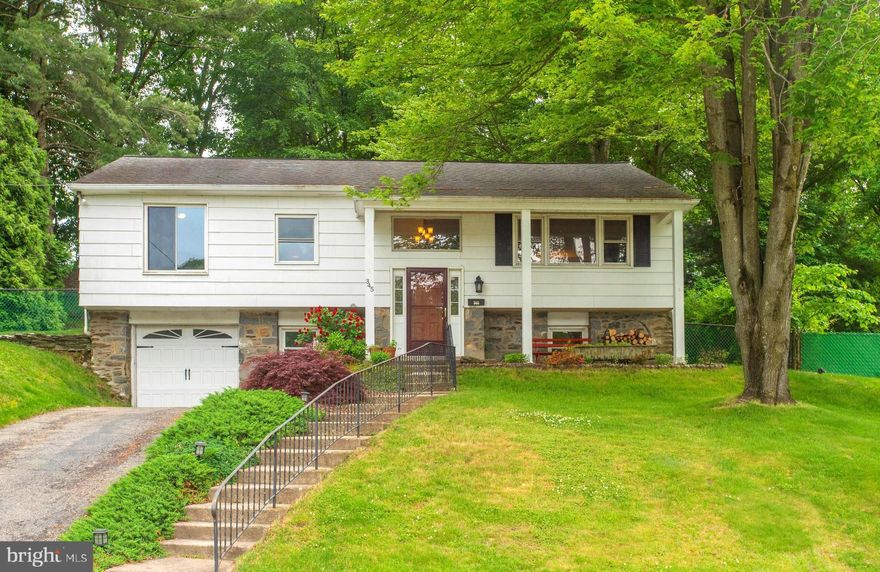 Spacious 4 bedroom 2 1/2 bath Home in the sought after Merion Golf West/Paddock Farms neighborhood of Haverford Township. Convenient to shopping, dining, transportation, Haverford Township & Ludington Libraries, Universities, Medical Centers and train systems nearby in Ardmore, Haverford & Bryn Mawr. Easy access to 476 and less than thirty minutes to Center City, Valley Forge, Turnpike & Airport. Short walk to Haverford Area YMCA, Paddock Farms Park & other Township Parks that include: softball / baseball fields, playground equipment, tennis courts, basketball courts, barbecue and nature areas. Award-winning Coopertown Elementary and Haverford Schools. Open Front porch, entrance foyer,  large living room with bow window letting in a ton of natural sunlight, open concept kitchen with lots of cabinets & counter space, refrigerator, gas stove, microwave, dishwasher & disposal,  dining area leads to family room with cathedral ceilings with 2 skylights, gas fireplace, french doors to deck, rear yard with a great view with privacy.  Hallway leads to the first bedroom, hall bath, second bedroom and the master bedroom with ample closet space ,recently renovated master bath.  Lower Level is a large recreation room, fourth bedroom, half bath, utility / storage room, laundry area, attached garage, driveway and side yard. Long driveway with plenty of space for off-street parking. New HVAC system installed in 2019.  Roof replaced in 2009. Low maintenance brick and siding  home with a poured concrete foundation.  Includes: Refrigerator, washer, dryer & ceiling fans.  An excellent opportunity to own a home in this wonderful neighborhood in Haverford Township.