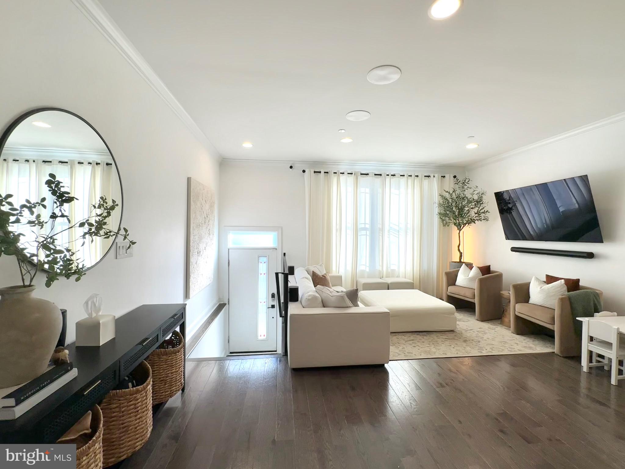 Modern Hilltop Luxury with Sweeping Views in Manayunk
Perched on a hilltop overlooking all of Manayunk, this 3000+- SF home, 3-bed, 3.5-bath home offers a stunning open layout, hardwood floors and sleek modern design — all just minutes from Main Street Manayunk.
Built in 2019 by Michael James Contracting, this eco-friendly home has 3 years remaining on the 10-year tax abatement. Inside, enjoy high ceilings, expansive windows, and an open floor plan filled with natural light. The chef’s kitchen features stainless steel appliances, a large island, and beverage station — perfect for entertaining or busy mornings.
The spacious primary suite spans the entire top floor with double vanities, dual shower, two large walk-in closets, and private access to a rooftop deck with panoramic views and a wet bar just steps away. Each level above the main floor includes a full bath, plus second-floor laundry for convenience.
The finished basement boasts new flooring with transferable warranty, and the private backyard patio offers a quiet escape with built-in planters. Dual-zone HVAC and contemporary finishes throughout.
Enjoy quick access to regional rail, Wissahickon trails, the Schuylkill River, and Center City. Schedule your private tour today!