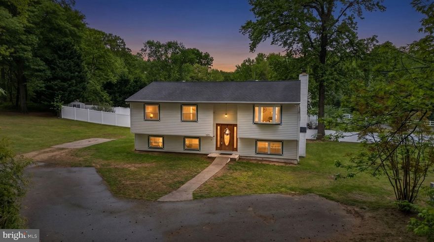 Tucked away off Arundel on the Bay Road in the community of Walnut Lake, this inviting 3-bedroom, 3-bath home offers the perfect blend of privacy and convenience on a beautifully fenced .65-acre lot. Just minutes from downtown Annapolis and the scenic trails of Quiet Waters Park, the location alone is hard to beat.
A tree-lined driveway sets the tone as you arrive at this spacious split foyer, where natural light pours in to highlight the open, airy layout. The upper-level features an open floor plan, 2 spacious bedrooms, and a serene primary suite complete with its own private balcony—perfect for morning coffee or unwinding at sunset.
Downstairs, you’ll find a warm and welcoming rec space with a cozy fireplace, an office, and abundant storage to fit your lifestyle.
Opportunities like this don’t come along often—come experience the charm and potential of this Annapolis-area gem for yourself.
Property being sold as-is.
