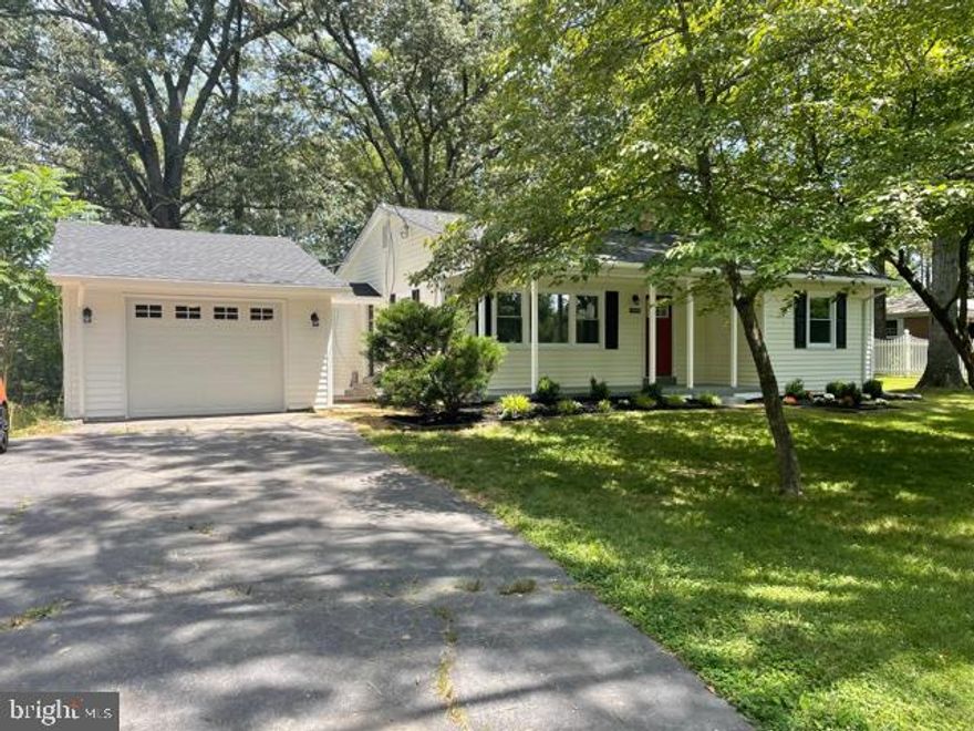 This is the best house on the market in this price range.  Fantastic rehab. Updated custom kitchen with quartz counters, stainless appliances , soft close cabinets. Two custom updated baths. New HVAC. New windows throughout.  New flooring.  New roof. Tons of parking including a detached 1 car garage. Huge private almost 3/4 acre lot.  Tons of privacy.  Dont hesitate on this one!!