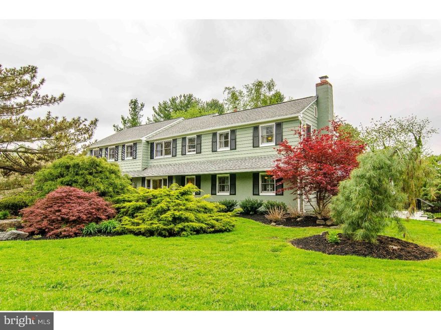 23 Brookview Lane is a wonderful 5-Bedroom home where family memories will be made that last a lifetime. Gorgeous lot on a cul-de-sac with beautifully landscaped grounds, level front, back and side yards perfect for play and sports.  Beautiful stone walls surround a new driveway with stunning slate walkways front and back. Separately fenced oversized pool, requires minimal maintenance with large hot tub/spa, blue stone coping,  large seating area in deep end, stone waterfall, and large deck spaces.  Hardwood floors throughout.  Brand new Eat-In Kitchen with GE Caf -Series stainless appliances including gas convection double oven, refrigerator with hot/cold running water and a Keurig dispenser, premium soft-close cabinets with lifetime guarantee, travertine backsplash, granite countertops, and porcelain-tile floors from Kitchen into Laundry Room and newer Powder Room.  Oversized Family Room with Brazilian cherry floors, stone fireplace and hookups for a wet bar. New French doors separate the Kitchen to a Bonus Room (Office/Cave). Back door exits to a covered slate Patio with natural gas hookup for a grille. Second floor features huge Master Bedroom with updated Master Bath, four nice-size Bedrooms and a brand-new Hall Bath with porcelain tile floors. Beautiful views from each of the 30 windows.  Central vacuum system includes a kick-plate in the Kitchen for easy cleanups as well as ports on each level including Basement and garage.  Newer pull-down stairs to full Attic. Minutes away from award-winning Wallingford-Swarthmore schools, train, major highways and the charming towns of Swarthmore and Media.