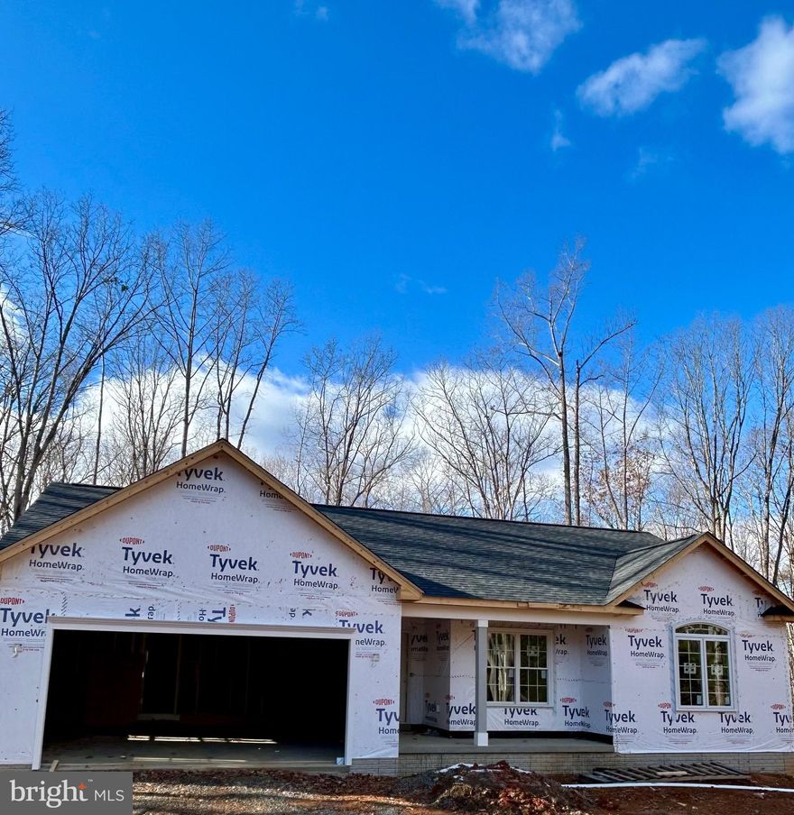 UNDER CONSTRUCTION - CHARLESTON II MODEL - LOT 4 located on a lovely 6.379 acre lot. Home will include an open floor plan with stainless steel appliances and granite counter tops in kitchen, primary bathroom with double vanity sinks and walk-in shower; Covered front porch, unfinished basement with bathroom rough-in for future expansion and a 2 car garage. Upgrades are available but not included in list price. Still time to make selections! Call for more information or to schedule a showing! Road Maintenance agreement.