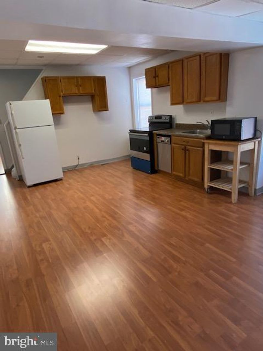 Perfectly situated between Fed Hill & Locust Point, this spacious apartment is filled w/ natural light! Move in ready, this home includes three bedrooms, one full bathroom, one half bathroom, central a/c, laundry, and more! One block to Riverside Park, close to Federal Hill, bars, restaurants, shops, stadiums, Inner Harbor, etc Easy access to 95. Application fee is $40 per adult applicant.  Total household income must meet requirement of 3X monthly rent. Minimum credit score requirement is 620.