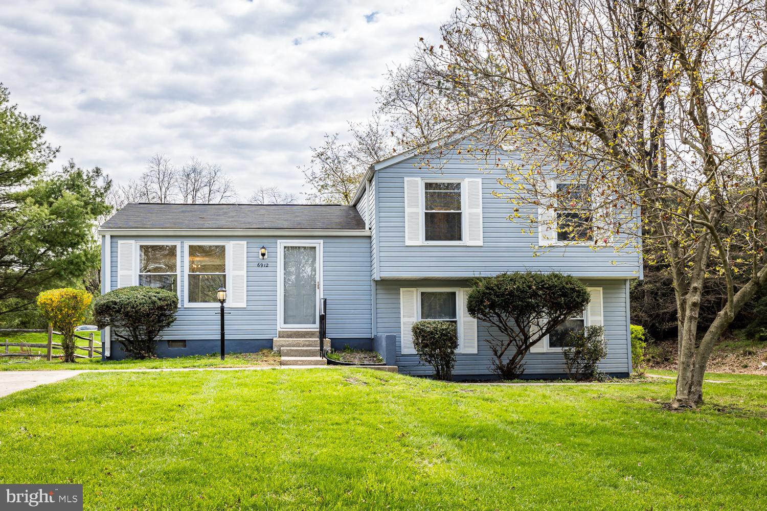 OPEN HOUSE CANCELLED. HOME IS UNDER CONTRACT. Wonderful location on end of cul de sac, wooded area on side, backs to open green space. Enjoy privacy and green space around home. Welcome to 6912 Bugledrum Way! Pride of ownership and lovingly maintained by original owner. This is your chance to update and refresh and make this home your own. New step and small patio in back yard from dining room slider door. Upon entry, you will flow directly into open living /dining combination with slider door to back yard. Lots of natural light. Kitchen off of dining room. A few steps up and you will find three bedrooms, hall bath, and the primary bedroom with attached full bath. The bathrooms were refreshed in 2021 along with a new ceramic tile kitchen floor. The lower level provides additional living space along with an unfinished area with washer/dryer, furnace, water heater, and door to side yard. Enjoy all the amenities that Columbia has to offer - including pools, walking/biking trails, gyms, tot lots, and much more. Home warranty included.