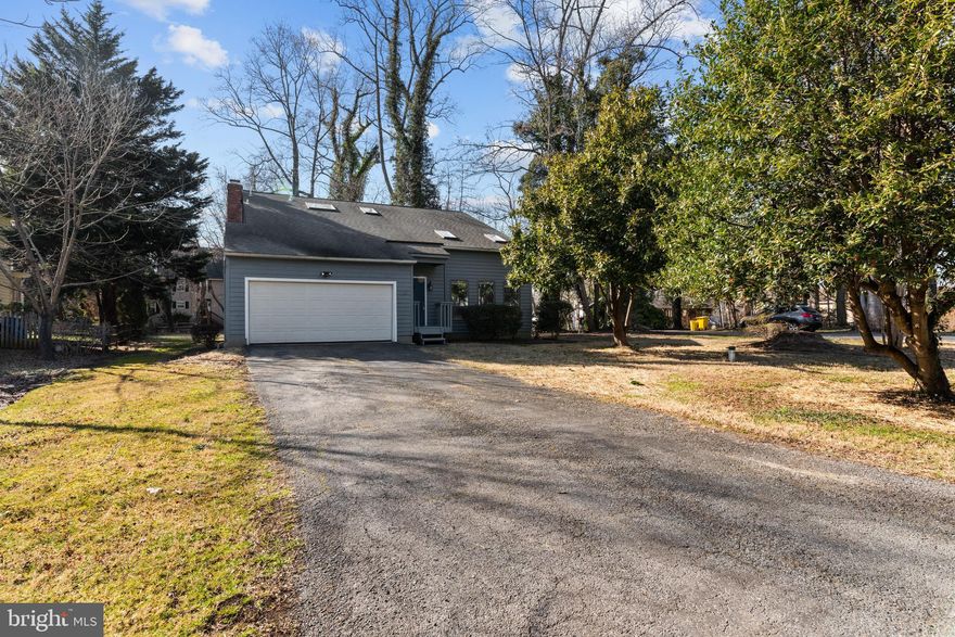 Charming Contemporary home located in highly desirable community of Pleasant Plains.  This home has many recent upgrades - New LVP on the main level and New carpet on upper level.  Freshly painted throughout, front porch and back deck newly stained, landscaping entire yard.  Kitchen has stainless appliance and eat-in table space with Family room combo with 2 New sliders leading to the deck and Stone Fireplace.  Open Vaulted Ceiling in Living room, dining room, remodeled 1/2 BA on main level and laundry/mud room with 2 car garage.  Upstairs consists of 4 BR - Primary BR with vaulted ceiling and big primary bath and extra large walk-in closet.  Unfinished basement is perfect space to finish with walkup stairs.  Roof 9-10 years, HVAC 2015.  Broadneck Schools.


The home is located on a private corner lot over 1/2 acre.