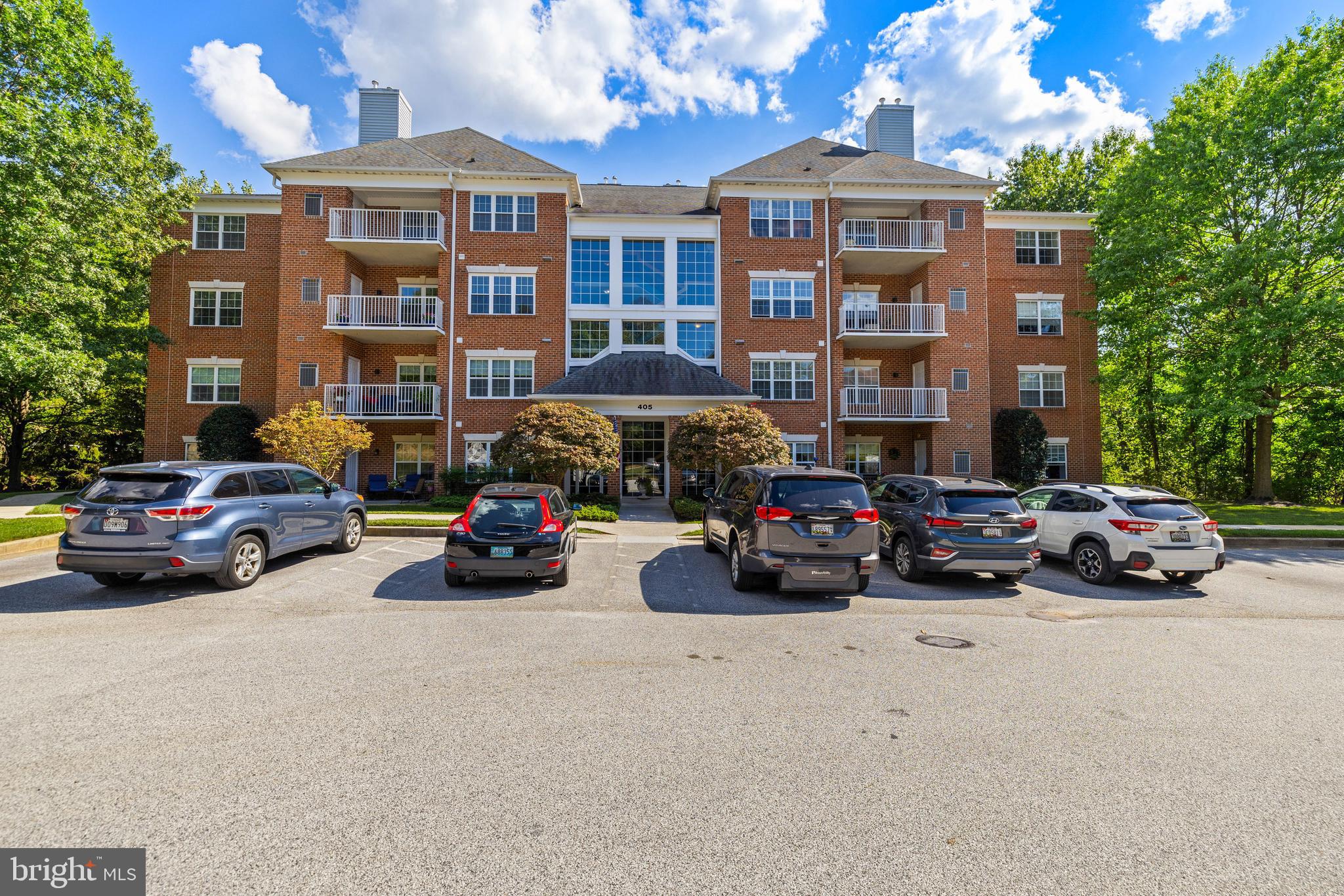 Wonderful like new spacious condominium secluded at the end of a cul-de-sac in the community of Plumbridge/Mays Chapel North! This condo has been pampered by its owner throughout the years with added new stainless steel appliances, new washer & dryer, beautiful hardwood flooring, plush carpet in the spacious bedrooms, neutral paint, crown molding and chair rail! Primary bedroom with its well cared for primary bath and a huge walk-in closet! Also equipped with another full hall bath that has hardly been used, a nice size laundry room and a second bedroom with a large closet! Enjoy cozy evenings by the corner gas fireplace, a charming focal point that adds warmth to the living room. A fantastic light filled eat in updated kitchen with a door to a private balcony, a serene spot for morning coffee or evening relaxation. This condo has so much to offer located on the top level 4th floor with an elevator, close to shopping, dining, pools, schools and all else Timonium has to offer! Don't miss this one! Pictures will be on Friday!