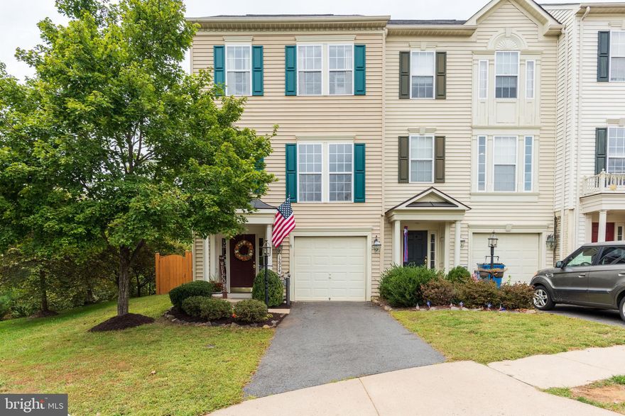 3BR/3BA 3-level end-unit townhome in Linton Hall! Entry level rec room w/ full BA walks out to fenced rear yard! Open concept main level w/ large kitchen w/ island leading to huge rear deck w/ views for miles overlooking private wooded common area! Upper level master suite w/ walkin closet & double vanities! Large secondary BRs & hall BA! Call today for your private showing!