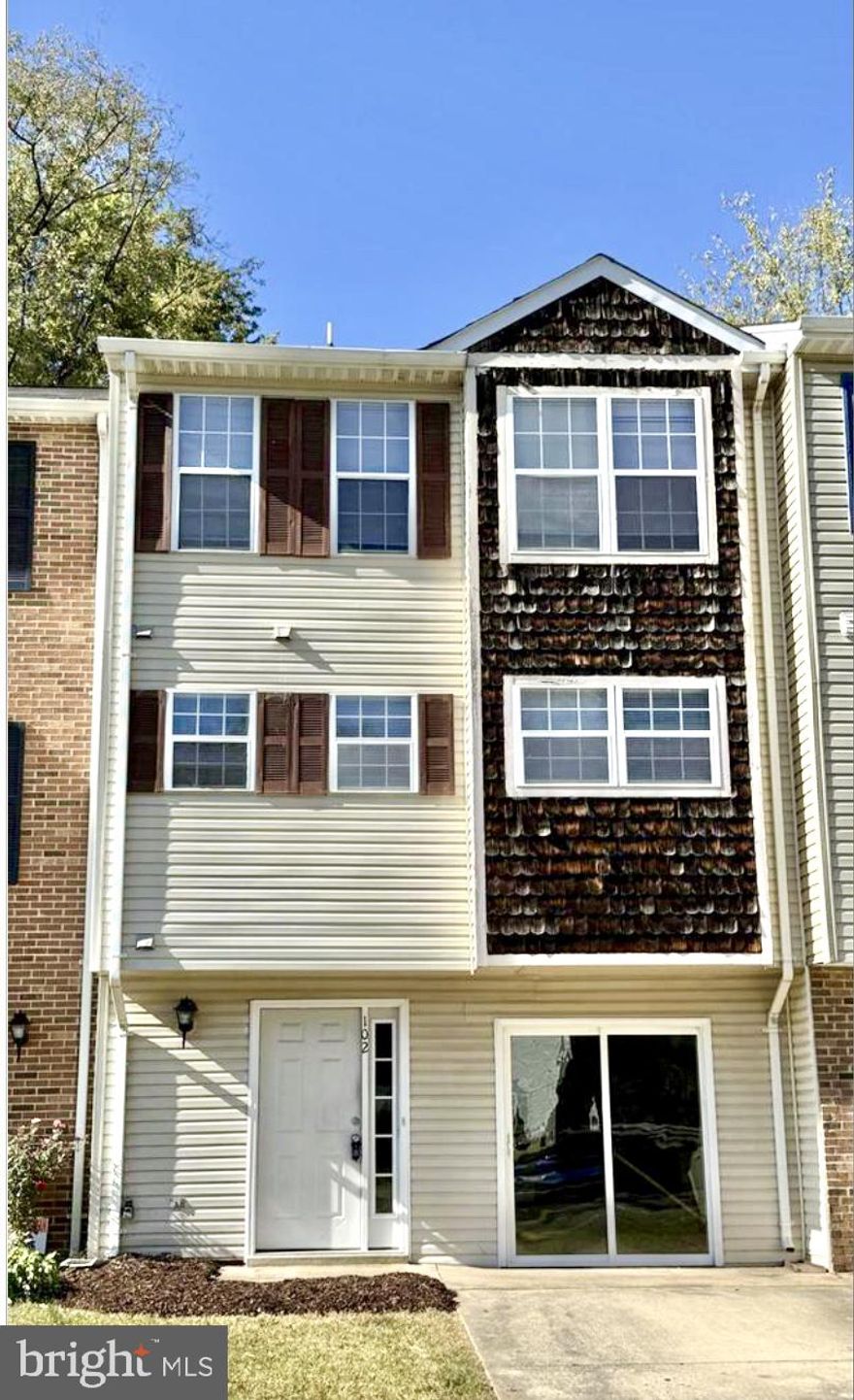 Pets on a case to case basis!  This charming and fully updated 3-bedroom townhouse is ready for you to call home! With 1 full and 2 half bathrooms, this spacious rental features brand-new carpet and luxury vinyl plank flooring throughout, creating a fresh, modern atmosphere. The entire home has been enhanced with stylish new light fixtures, giving it a warm and contemporary feel. The kitchen offers space for a breakfast table, and there's also a separate dining area—perfect for gatherings or quiet dinners at home. The living room features a cozy wood-burning fireplace, ideal for relaxing evenings, and it opens to a large deck with all-new decking, overlooking a fully fenced backyard—great for entertaining or enjoying your morning coffee outdoors. The lower level offers a versatile bonus space that’s perfect for a rec room, a space for guests when family visits,  home office, or workout area, along with plenty of extra storage. With your own private driveway for easy parking and a convenient location close to shops, dining, and commuter routes, this home has it all.  There will be a repair deductible for tenants to pay the service fees for any repairs caused by tenants.  Don’t miss out on this inviting space—apply today and make it yours!