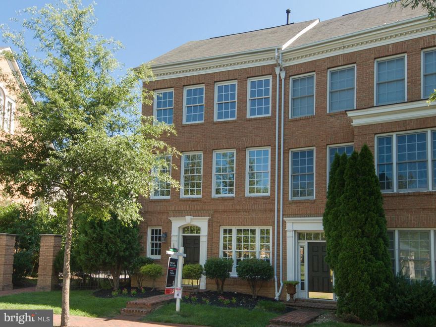 Impressive end unit crescent TH with windows flooding the interior w/sunlight. New neutral carpet,lavish crown molding,5-inch hdwd floor on main level & freshly painted throughout! Spacious family room with marble fireplace & gourmet kitchen both open onto an oversized deck-great outdoor space! 2 Master suites, 3rd bdrm w/bonus 2nd family room. Ample storage space! Close to gazebo,clubhouse &park!