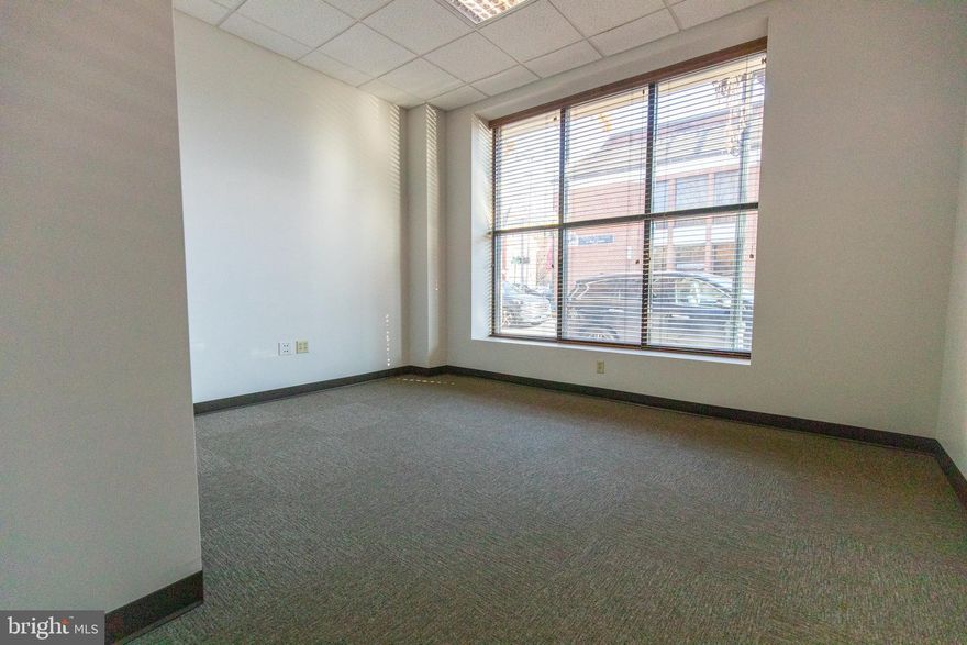 Welcome to Vandalia on Queen in Downtown Martinsburg’s Newest Professional Hub!
Located at 101 S. Queen St, this freshly reimagined office building offers multiple private offices for lease in the heart of downtown, just steps from shops, restaurants, the courthouse, and the city’s growing downtown district.

Each office includes high-speed internet, electric, water/sewer, and mail service, all wrapped into one simple monthly rate. Tenants also enjoy access to two shared conference rooms, a spacious break room, and thoughtfully updated common areas designed for comfort and productivity.

Need more than one office? No problem. Multiple spaces can be leased together for growing teams, small firms, or solo professionals who want a dedicated work area plus an additional meeting or admin space.

A private parking lot is located behind the building, and parking passes are available for just $30/month for tenants who prefer guaranteed off-street parking.

Whether you’re launching a new venture, expanding your footprint, or upgrading from a home office, Vandalia on Queen delivers an affordable, flexible, and modern workspace in a prime Martinsburg location.

Come be part of downtown’s next chapter. Offices are available now and secure your space today!