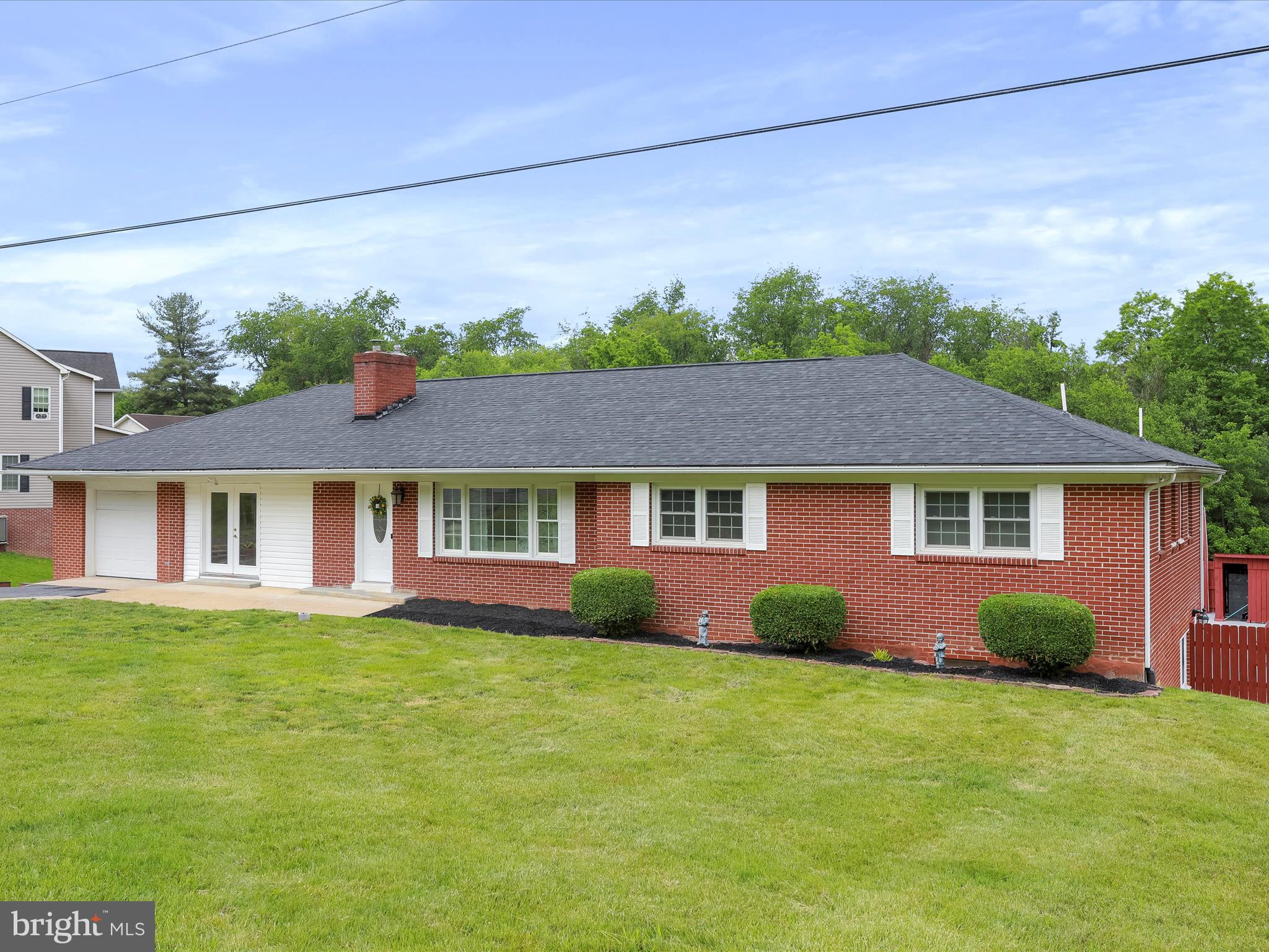 **Motivated Seller!!** Back on the market at no fault of the sellers! Buyer financing fell through. Get INSTANT EQUITY - Home JUST appraised for $480,000!! COMPLETELY RENOVATED FROM FLOOR TO CEILING 2025. Welcome to this stunning, fully updated all-brick rambler tucked away in a quiet cul-de-sac in the heart of New Market! Situated on just under an acre, this beautiful home has approximately 3,300 square feet of finished living space. This 5-bedroom, 4-full bath home offers timeless charm with modern upgrades throughout. Enjoy single-level living with a fully finished walk-out basement! The open-concept main level, large windows that fill the home with natural light, luxury vinyl plank flooring, BRAND NEW roof, BRAND NEW water heaters, and brand new Carrier AC are just some of the impeccable updates made to this home.
The beautifully renovated kitchen features BRAND NEW quartz countertops and BRAND NEW stainless steel appliances, seamlessly flowing into the living and dining areas—perfect for entertaining. The spacious primary suite includes a private en-suite full bath for your comfort and convenience.
The fully finished walkout basement is bright and welcoming with full-sized windows, a full bathroom, multiple access points AND a rear entry garage or workroom offering flexible living options for guests, multi-generational living, or income generating rental potential.
Step outside to a BRAND NEW deck that overlooks a peaceful and very spacious, wooded backyard. You’ll also find an easy-maintenance above-ground pool with a surrounding deck and privacy fence where your private retreat awaits!
Serviced by public water and sewer—no septic to worry about—this home is conveniently located just off I-81, making it perfect for commuters. Your new home is only minutes from downtown New Market, Shenvalee Golf Resort, Endless Caverns, and New Market Battlefield Historic Park. Plus, it’s just 20 minutes to Harrisonburg and less than 30 minutes to Bryce Mountain Resort and Shenandoah National Park.
Plus, there is NO HOA! This property has it all and will not disappoint! Don't miss the opportunity to call this remarkable property home, where unbeatable country living and classic charm converge in quintessential harmony. Schedule your showing today!