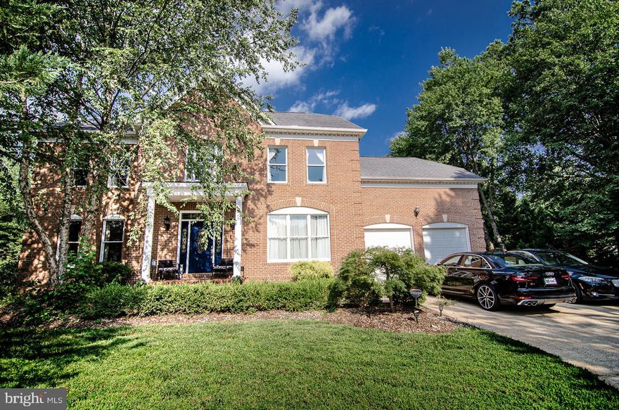 ************OPEN HOUSE SUNDAY 12-2PM***********@@@FINAL PRICE REDUCTION! @@@  A secluded one half acre that's close to it all. Nearly 5000 sq. ft. with a dynamic open floor plan - make it yours for Thanksgiving! A beautiful, warm, and inviting experience for you and your guests, perfect for entertaining. Located in walking distance of the historic George Washington?s Mount Vernon; the property is registered on one of the five original Washington Farms. Enjoy walking and biking along the Potomac, birds in the morning and deer in the evening a true country feeling in the city. You will have a majestic staircase, soaring ceilings, crown molding, wood floors, beaming interior light, lots of windows, gourmet kitchen, bi-level Veranda decking, regal columns, large dining room with butler's pantry, half bath, den/office and separate living room on the main floor with a double sided gas fireplace. Once upstairs you can retreat to the large master suite with tray ceiling, seating area, remodeled master bath and walk in closets. Down the hall find 3 additional bedrooms, 2nd ensuite and 3rd full bath. Easy living with laundry near the bedrooms.  On the lower level enjoy a finished walk out basement with wine cave/library, large family room with a second double sided gas fireplace, and full Bath. Perfect for a casita or rental (5th Bedroom) the lower level includes a 2nd kitchen with sink, dishwasher and refrigerator enclosed with service counter. Plenty of large closets for storage of all your special seasonal items. Completely wired for HDMI/cat5, Family Room TV is already installed. Make use of the 2.5 car garage with installed shelving, Montessori school 250 ft., only one neighbor, fabulous outdoor spaces and easy access to Old Town, Ft. Belvoir, Huntington Metro, MGM, National Harbor and the DC area. This 2000's home is ready and willing to cater to both your entertainment and todays work-from-home needs.  What owners say they love about this home:  "It has a unique country feel and it's very secluded, look out the trees to the left before you pull out of the drive, it's truly private. We can easily Uber out to Old Town or National Harbor without care. Shopping at all of our favorites are just nearby, TJ Max, Home Goods, Aldi and Wegmans to name a few. Lots of local quick eats some favorites include Mama's Kitchen and McAlister?s Deli. We often sit out and enjoy the wildlife in the garden, deer and song birds are so relaxing. In the winter when it snows our road always gets cleared first.  It's a well established neighborhood"