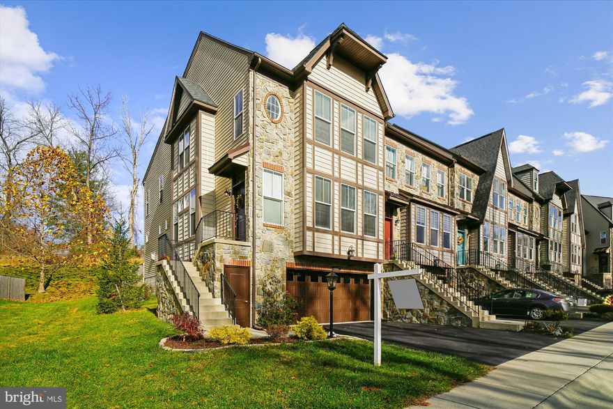 Experience the pinnacle of refined living in this exquisite 3-bedroom, 3.5-bath end-unit townhouse, where every detail has been thoughtfully curated for elegance and comfort. Bathed in natural light unique to its coveted end-home position, the open-concept main level showcases rich dark hardwood floors, a sweeping 10-foot kitchen island, and bespoke cabinetry—an entertainer’s dream. Architectural touches, including graceful arched openings, bring both sophistication and character, while the bump-out enhances space and flow. Step outside to a private backyard oasis, perfect for serene mornings or elegant gatherings.

The upper level is a retreat of unparalleled luxury. The owner’s suite boasts a tray ceiling, generous walk-in closet, and a spa-inspired bath with dual vanities and a soaking tub designed for ultimate relaxation. Two additional well-appointed bedrooms, a stylish hall bath, and a conveniently located laundry room complete the level, offering both functionality and refined style.

The fully finished lower level adds exceptional versatility, featuring a spacious rec room (with egress) that can serve as a home theater, office, gym, or family space, accompanied by a third full bath and abundant storage.

Meticulously upgraded throughout, this exceptional end home blends timeless design with contemporary luxury. Every corner reflects thought, care, and style—truly a home to be experienced. Schedule your private tour and discover the art of modern living.