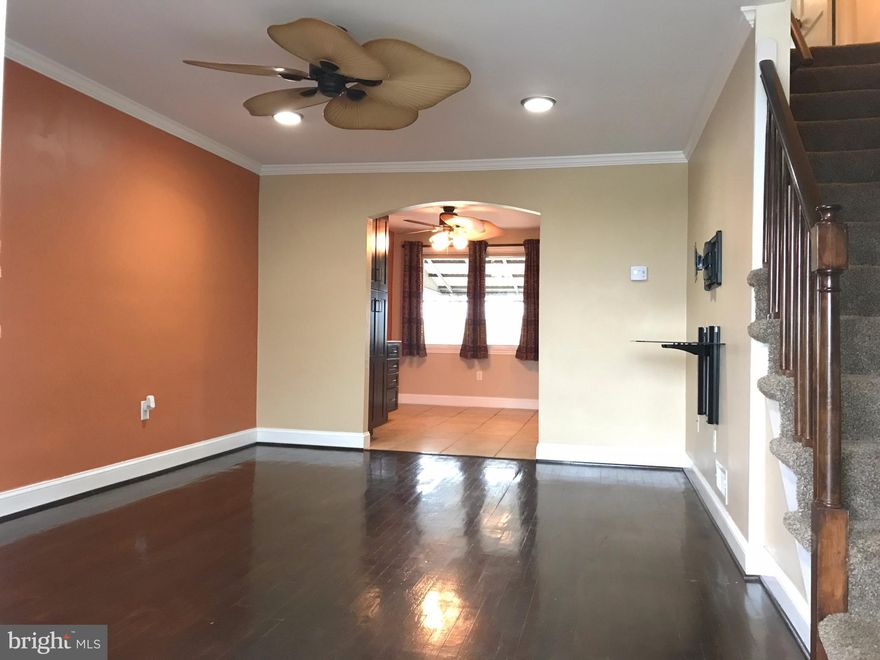 *Reduced to sell!* Luxurious townhome offering generous room sizes, high-end finishes throughout including Silestone counters, stainless appliances, dark wood flooring, ceramic tile, professional paint & premium fixtures. Located on a sought after street backing to a park with plenty of parking! Ravens fans will "flock" to this basement. Must see to appreciate! Move-in & enjoy immediately!