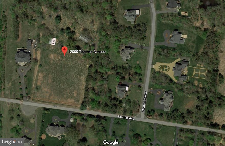 Gorgeous 5 Acres lot ready to build. Surrounded by new multi-million dollar homes. Public sewer line and Nat al gas line is available for hookup. House and barn on lot are tear down condition.