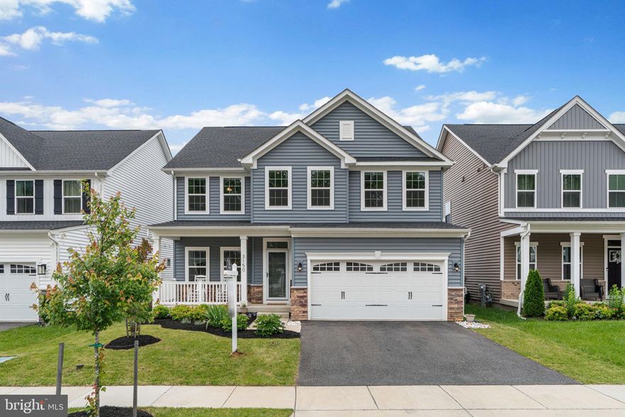 Welcome to 3150 Dodder Way, a stunning residence nestled in the desirable Two Rivers Community of Odenton, MD.  This remarkable 5 bedroom, 4.5 bathroom Ryan, Hudson model home offers a harmonious blend of luxury, comfort, and functionality across its well-designed spaces.

The primary bedroom is a true retreat, boasting its own en-suite bathroom for ultimate privacy and relaxation. The second bedroom also features an en-suite bathroom and two spacious walk-in closets, offering ample storage.   Bedrooms three and four conveniently share a large bathroom equipped with dual sinks, providing convenience for family members or guests.  An upstairs laundry room enhances convenience, making everyday chores a breeze.

The main level greets you with a formal living room at the front of the home, perfect for welcoming guests or enjoying quiet moments.   A seamless combination of family room, dining area, and kitchen creates an open, inviting atmosphere, ideal for entertaining and everyday living.   The kitchen is a chef's delight, featuring a huge quartz island, GE Profile stainless steel appliances, a gas range/stove, and built-in oven and microwave.

High ceilings at 10 feet amplify the sense of space and elegance.  An office provides a dedicated workspace for remote work or study.  Step outside to a screened-in porch, leading to a backyard with a tall privacy fence, perfect for outdoor relaxation and gatherings.

The lower level includes a fifth bedroom, offering flexibility for guests or additional family space. 
 Unfinished storage space in the basement provides ample room for seasonal or excess belongings.  The home also features a tankless water system and a radon remediation system.  The two-car front-loading garage ensures parking ease and additional storage options.

Additionally, this beautiful home is set within the premier community of The Woodlands in Two Rivers.  You'll enjoy access to an array of resort-style amenities while being tucked away from it all—a perfect way to conclude your day. The community's extensive amenities include a 10,000+ Sq. Ft. Clubhouse featuring a Meeting Room, Game Room, and Fitness Center, a Resort-Style Outdoor & Competition Pool, and courts for basketball, tennis, and sand volleyball. Explore the hiking and biking trails, community garden, environmental park, dog park, and more.

This home is a true gem, offering luxurious features in a vibrant community setting. Schedule your private tour today and experience the beauty and functionality of 3150 Dodder Way.