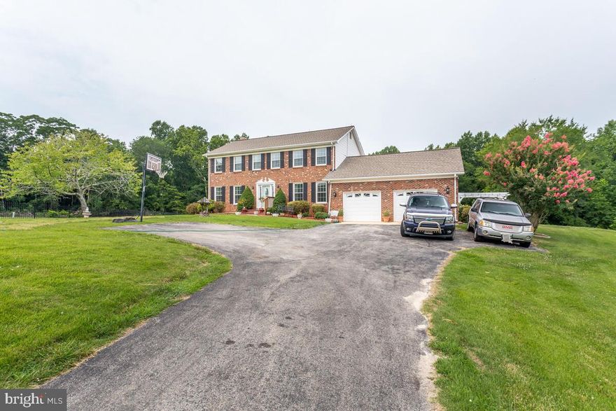 BACK ON THE MARKET! FINANCING  THROUGH ..Beautiful,l stately, custom-built Colonial approx., 3527 sq ft on over 4.5 ac. . Large bedrooms make this home stand out.  Beautiful hardwoods were added throughout the entire home  Mostly cleared 4.5 ac. of rolling land. Added in the last 5 years: roof, insulated windows, hardwoods in the bedrooms, new garage doors, updated bathrooms. Updated energy-saving refrigerator and dishwasher Stainless Steel. The cooktop is new. Countertops are granite. The septic drain field is new, new sump pump with added french drain. Within an hour of D.C., 1/2 hr to upper Marlboro main street.