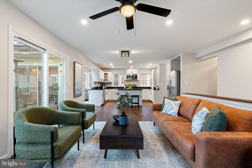 Exceptional Space, Prime Location, and Timeless Care in the Heart of Fairfax City
Welcome to this expansive and beautifully updated 7-bedroom, 4-bathroom residence offering approximately 3,800 square feet of living space, ideally located within walking distance of vibrant Downtown Fairfax City. Enjoy the best of both worlds—peaceful residential living paired with unmatched walkability to Starbucks, Walgreens, Tjmaxx, 7-eleven, yoga studios, gyms, restaurants, pastry shops, breweries, salon’s, juice bar, along with many more Mom and pop local retail & food/drink businesses. The list of things to do is endless within minutes from your doorstep. With proximity to George Mason University, Steps to Fairfax Swimming Pool, parks, trails, and convenient access to major commuter routes and Metro options, this location is truly unbeatable.
Lovingly maintained by its original owner, this home radiates warmth, pride of ownership, and genuinely good energy—an inviting place where memories have been made and care has been evident throughout the years.
The thoughtfully designed floor plan offers incredible versatility. The upper level features four generously sized bedrooms and two full bathrooms, including a spacious and serene primary suite designed for comfort and retreat. The primary suite offers abundant space for a sitting area, a large walk-in closet, and a beautifully refreshed en-suite bathroom featuring new dual sink vanity, lighted mirror, a soaking tub, a standalone shower with new gold rain shower head, and newly installed flooring—creating a true private oasis.
The main level includes two additional bedrooms and a full bath, ideal for guests, home offices, or convenient main-level living. A fully finished basement with its own private entrance adds exceptional flexibility, featuring a large recreation room, 7th bedroom, den, and a full bathroom—perfect for multi-generational living, an au-pair or in-law suite, or income-producing rental potential. The basement utility room includes a washer, dryer that convey, a utility sink, and ample space that could easily be converted into a kitchenette.

The main level is an entertainer’s dream, offering formal living and dining rooms, a cozy family room, and a stunning sunroom addition off the kitchen. With walls of windows, the sunroom floods the home with natural light and creates the perfect space for a second dining area, morning coffee retreat, or relaxed conversation area.

Recent updates and upgrades include:

Luxury LVP flooring on the upper and lower levels. 

Solid hardwood flooring throughout the main level. 

Fresh interior paint. 

Updated light fixtures throughout. 

Refreshed main and upper-level bathrooms with new vanities, mirrors, fixtures, and new flooring in the primary en-suite.

Updated kitchen with granite countertops, new stainless steel gas stove and dishwasher, newer refrigerator and microwave, and new hardware.

Newer windows, 

Composite deck with a large canopy that conveys.

Outdoor living is equally impressive, featuring a covered front porch spanning the length of the home, perfect for morning coffee or evening unwinding. The fully fenced backyard offers a rear and side yard, extended driveway for ample parking, and fully enclosed storage beneath the deck—ideal for equipment, bikes, or seasonal items.

This is a rare opportunity to own a spacious, flexible, and impeccably cared-for home in one of Northern Virginia’s most desirable locations. With room to grow, income potential, and a truly special feel, this Fairfax City gem is ready to welcome its next chapter.