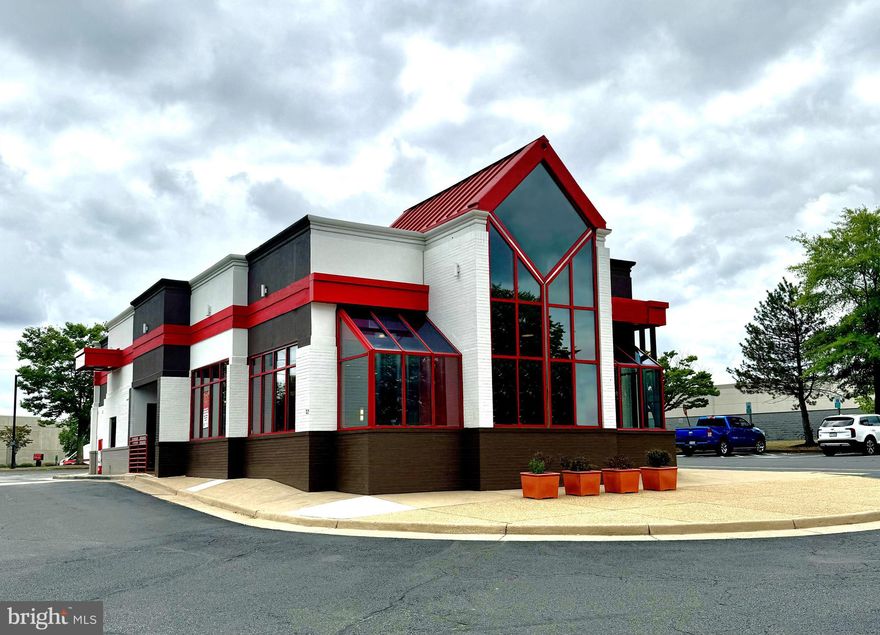 Rare opportunity to own a freestanding building with  drive thru on 1.5 acres. Zoned B-1 General Business; can be used for many uses  that are by-right in B-1 zoning such as child care, school or college, adult care facility, event center, religious institution, laundromat, pet store.  Approximately 3,215 SF retail building with large open area and commercial kitchen. Equipment to convey: Oven and fry hoods, walk-in refrigerator, and freezer. Special Use Permit in place for a drive-thru window. Building will be delivered vacant. Located in the retail corridor along Rt. 234 Business/Sudley Rd., only one intersection away from I-66 ramps. Adjacent to Harbor Freight, Pep Boys, Home Depot and many retail shops in the Promenade at Manassas shopping center.   Large parcel with 40 parking spaces and three entrances for easy access to site.