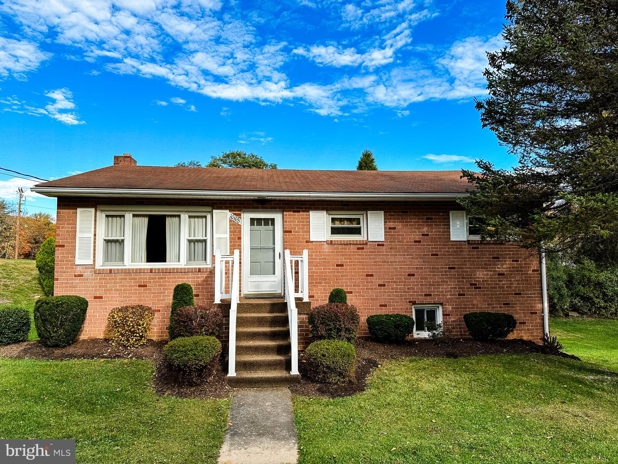 Whoa! What a Charmer! This ADORABLE 3bed/1 bath brick rancher is cute, cute, cute! Beautiful brick exterior with lovely landscaping, an inviting covered deck, and lush yard. Inside is a GORGEOUS kitchen with golden oak cabinetry, Jen-Air double oven & cooktop, and a large peninsula with bar stools. You'll LOVE the mud-room off the kitchen with laundry, a pantry, and storage! Down the hall you'll find 3 spacious bedrooms and bathroom. Let the basement be a blank canvas for your imagination! Some walls are framed up, electric is in place, and there is a rough in for a second bath! Come see this one today! You'll be glad you did!