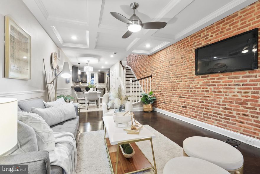 OFFER DEADLINE MONDAY 1/15 @ 5PM, HIGHEST & BEST OFFERS DUE --- CLEAN & PRISTINE HOME W/ 3 FINISHED LEVELS & OFF STREET PARKING JUST STEPS FROM PATTERSON PARK - this well maintained home features an open floor plan with hardwood floors throughout the main level, exposed brick, coffered ceilings, wainscotting trim, separate dining area and a stylish kitchen with granite countertops, convenient breakfast bar, ss appliances and tile backsplash w/ under cabinet lighting leading to your own parking pad.  The upper level owner's suite offers tray ceilings and a connecting bathroom with double bowl vanity and jetted soaking tub, great guest bedroom and full bathoom just down the hall with rear deck.  Fully finished lower level provides additional flex space with full bathroom and laundry room.  New roof June 2022 - complete roof tear off and replacement.