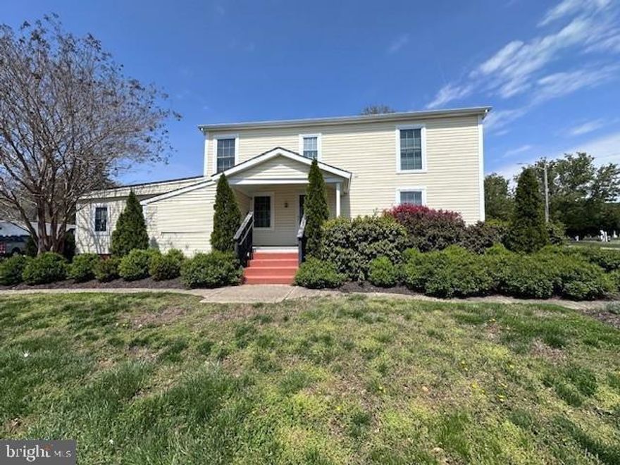 Rare opportunity to own a unique commercial property on a corner with  access off South Aurora Street and Creamery Lane. Property has a digital sign to offer more exposure for your business. Downstairs has multiple office space with bath. There is an upstairs unit that has a full kitchen and bath.  "Buyer to verify permitted uses". Full basement with outside access.   New 34X28  3 bay  pole barn.