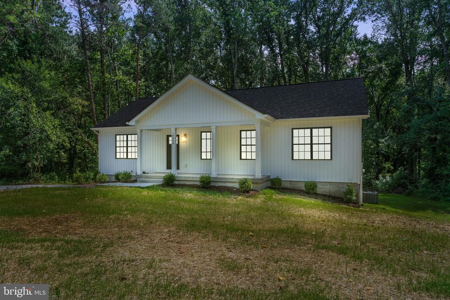 FINISHED NEW CONSTRUCTION! Beautiful 4 bedroom, 3 bathroom rancher on 1 acre. This home features a light and airy open floor plan, vaulted ceiling with stained wood beams, granite kitchen countertops, stainless steel appliances, farmhouse sink,  hardwood floors, tiled bathrooms, free standing tub. Finished basement with an extra bedroom, bathroom, office/bedroom, and HUGE rec room! Come see this gem today!