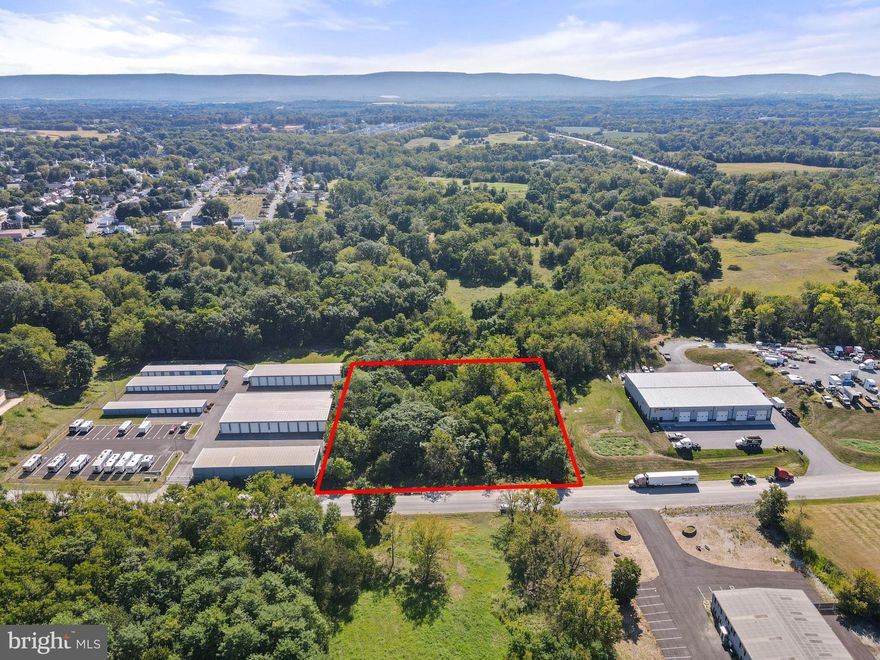 An incredible opportunity awaits with this 3-acre parcel of industrial-zoned land at 1432 Oak Ridge Pl—perfect for entrepreneurs, investors, and business owners ready to grow in a high-demand location. This property offers endless potential, whether you’re envisioning office space with an attached repair shop, a transportation hub, logistics center, or other commercial use. With plenty of space for truck access and maneuvering, this site is designed with functionality in mind. Old site plans are available to help jumpstart your vision, making development easier and faster. The location is truly unbeatable—just outside city limits, surrounded by established businesses including a storage facility on one side and a truck repair shop on the other, ensuring steady traffic and visibility. Daily conveniences such as shopping, restaurants, and gas stations are all nearby, while major transportation routes I-70 and I-81 are just minutes away, providing seamless connectivity for operations of any size. With its zoning, size, and strategic position, this property represents a rare chance to secure land in one of the most promising commercial corridors in the area. Don’t wait—capitalize on this unique opportunity to build, expand, and succeed in a location designed for growth!
