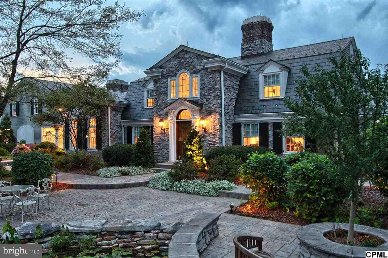 This beautiful estate is situated on a secluded 6.62 acre lot. Sophisticated finishes throughout this 8,000+ sf masterpiece includes a spacious master suite with luxury en-suite bath, 2nd master suite on the 2nd floor, 2 oversized secondary bedrooms, ample gourmet chef kitchen & indoor pool. Outdoor living at its finest includes a pool complete w/a private pergola, pond with waterfalls and mature landscaping.