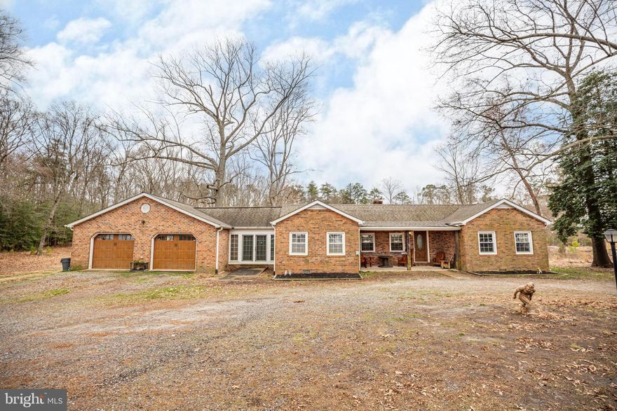 Desirable one level living on 2.51 acre lot.  A unique location near Colonial Beach but without the town taxes.  Five miles to the beach and 10 miles to Dahlgren Naval Base.  The home has 3 bedrooms with Dining room used as Nursery (forth Bedroom).  Two full baths (new and updated), Great room  w/ FP, kitchen, dining room, laundry/utility room, mud room, and over sized garage.  All major systems updated in 2015 to include: roof, HVAC, hot water and well pump.  Ample storage in pole barn  that is wired for electric but not hooked up to panel.  The new primary bath will give you a spa experience with separate shower and jetted tub, double vanity and large linen closet.  Per Westmoreland County the house was originally built in 1952 with a major renovation in 1990 and the garage added in 1997.  Kitchen & Bathroom renovations in 2017.   Enjoy access to major roads and the beach community.    Property qualifies for FHA, VA and USDA loans.
