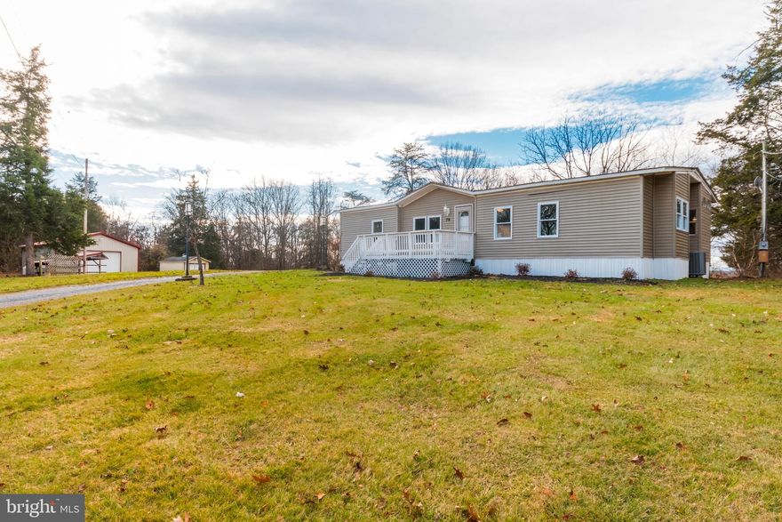 One of a kind property comes with two lots and over 5.5 acres with river frontage.   Home boasts a large 2 car detached workshop/garage and multiple other sheds and outbuildings. Workshop is heated and cooled and perfect for a mechanic to run a  small business.  Very private setting with no HOA. Enjoy fishing on your own river or four wheeling in your own backyard.  Home features 3 bedrooms and two bathrooms with new kitchen, new flooring, new paint, new hvac system and new appliances.