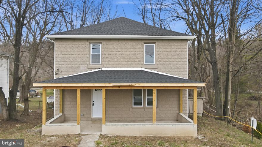 Updated home in Hedgesville minutes to town and Spring Mills/I-81!  This home features a new roof, windows, HVAC, water heater, flooring, kitchen, bathrooms, and other essentials.   Not much missed.  Check it out today!  High speed internet believed to be available.  On public water.  Parking and getting in and out is tight.