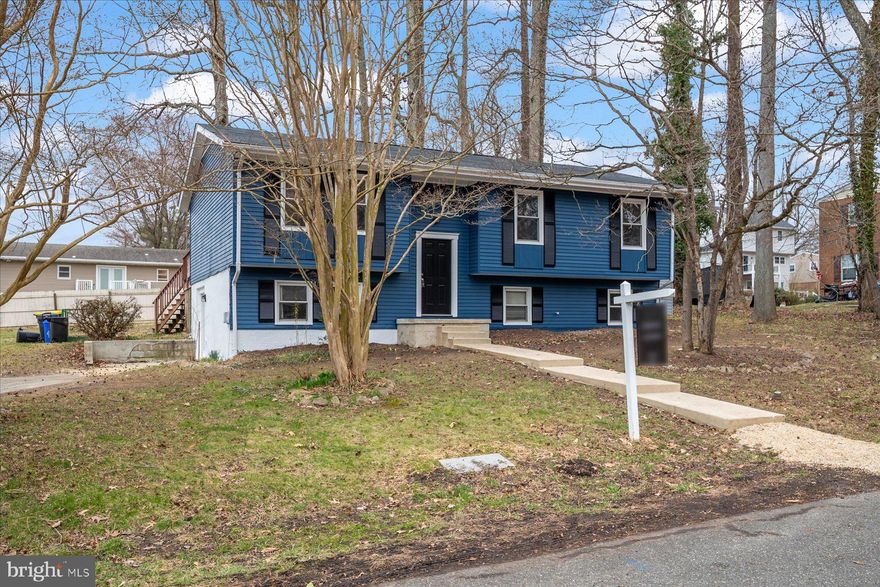 NEW ROOF INSTALLED!!   NEW EXTERIOR PAINT!!
This well-maintained home offers bright, open living spaces within the Chesapeake Beach town limits. Natural light, hardwood floors, and an easy flow between the living, dining, and kitchen areas create a comfortable setting for everyday living and entertaining.
The updated kitchen features a center island, ample cabinetry, and an open dining area with sliding glass doors leading to the backyard. The lower level offers multiple living spaces with flexibility for a home office, guest area, recreation room, or additional family room.

Situated at the end of the street, the home enjoys a nicely sized yard with room to relax, garden, or entertain. Living within the town limits provides convenient access to local beaches, boardwalks, dining, marinas, and community amenities, while still offering an easy commute to Annapolis, Joint Base Andrews, and Washington, DC. This home is located within the Town of Chesapeake Beach and residents have access to discounted beach access rates and more.