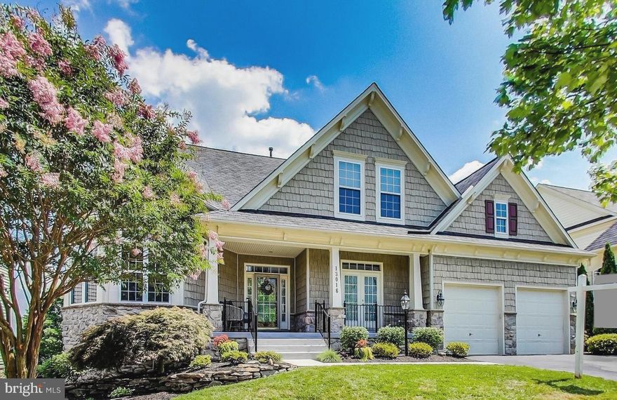 **Offers, if any, due by 9am on Mon 1/20** Experience timeless elegance in this stunning 5-bed, 4.5-bath single-family home in the sought-after Highlands of Clarksburg neighborhood, situated on a large 6800 sq ft premium lot with elevated rear views. Enter to the grand two-story foyer, beautiful hardwood flooring, and tons of natural light throughout. The spacious and open kitchen is a chef’s delight, featuring granite countertops, stainless steel appliances, double wall oven, generous cabinetry, peninsula with bar seating, and a sunny eat-in breakfast area that overlooks the serene backyard. The family room beckons with its cozy gas fireplace and large windows, while the adjacent formal living and dining rooms provide the perfect setting for hosting memorable gatherings. The thoughtfully designed main level includes a convenient powder room, a second staircase for easy access to the bedroom level, and a private study with built-in shelving—perfect for working from home or a quiet retreat. When ready to unwind, head upstairs to the spacious owner's suite featuring a picturesque bay window, a walk-in closet, and a spa-like bath with dual-sink vanity, tiled stand-up shower with dual shower heads, and a soaking tub. Those in need of more closet space will LOVE the expansive walk-in closet room adjacent to the bath, with custom built-in shelving and plenty of space for all your clothes and accessories. Three additional generously-sized bedrooms, two additional full baths and a laundry room with utility sink complete the upper level. The spacious lower level with 9'+ ceilings, offers incredible versatility, making it an ideal in-law suite, potential rental income opportunity, or private space for long-term guests. It includes a living room with a gas fireplace, a full kitchen with stainless steel appliances, dining area, a large bedroom with a walk-in closet, and a full bath. Two additional flex rooms provide options for a children’s playroom, a second office, theater room, or a home gym. Outdoor living is a dream, with a large front porch, "maintenance-free" composite deck off the main level and a stone patio accessible from the lower level providing a peaceful setting to enjoy your morning coffee, admire scenic green space views, or host a summer BBQ. Attached two-car garage and driveway provides off-street parking for up to 4 cars. Recent upgrades include new HVAC (2024), water heater (2023) and whole-house water filter. Enjoy all that this community has to offer, including two playgrounds, a tot lot, community green space,  the nearby Dowden's Ordinary Park, Harris Teeter and all of the shopping and restaurants that Clarksburg Village and Clarksburg Premium Outlets have to offer. Easy access to Rt.355 and I-270. Little Bennett Elementary, Rocky Hill Middle, and Clarksburg High School District. Don’t miss this!