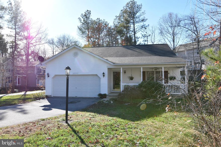 Lovely rambler at the end of the cul de sac. Hardwood floors thru out family room, dining room, breakfast nook and both bedrooms.  Gas fireplace in family room. Screened in porch with ceiling fans. 2 car garage.