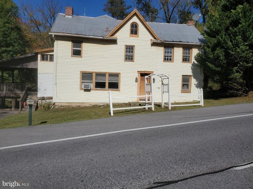 Complete renovation or possible teardown on .63 acres. Use your imagination.  Well & septic. No electric.