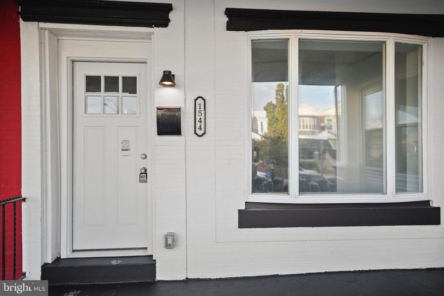 Welcome to 1544 N 62nd Street, a fully renovated 3 bedroom, 2.5 bath modern townhouse offering 1,600 sq. ft. of sleek, sophisticated living space. Step inside to a bright open concept main level featuring recessed lighting, wide plank luxury flooring, and an airy layout that flows effortlessly from the living area into a beautifully curated modern kitchen. The kitchen boasts quartz countertops, a stylish two tone cabinet design, brass fixtures, stainless steel appliances, and a spacious center island perfect for dining and
entertaining. A convenient half bath and laundry area complete the first floor, along with access to a large. private backyard ideal for relaxing, gardening, or hosting outdoor gatherings. Upstairs, you'll find three spacious dedrooms, including a primary suite wich a stunning day window, generous closet space, and a modern en-suite bathroom featuring floor to ceiling marble style tile, matte black fixtures, and a walk-in shower. The additional full bath offers the same designer finishes, giving the home a cohesive, high-end feel. The clean, freshly painted and water proofed basement provides plenty of storage and potential for additional living space or a home gym. Every detail in this home has been carefully designed from the new mechanical systems to the modern lighting and finishes making it completely move-in ready. Located just minutes from major roadways, public transit, and shopping, this home perfectly balances style, comfort,
anc convenience.