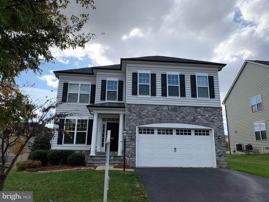 Beautiful and well-maintained 5-bedroom, 4.5-bath home in a quiet, sought-after neighborhood! This spacious home features an open floor plan with abundant natural light, hardwood floors, and a cozy fireplace. The updated kitchen boasts stainless steel appliances, granite countertops, and ample cabinet space. The primary suite offers a walk-in closet and a luxurious en-suite bath. Enjoy outdoor living on the private deck. Solar panels are installed, providing significant savings on the electric bill. This home also includes a 2-car garage and ample street parking. Conveniently located near major highways, shopping, and dining. Don’t miss this fantastic opportunity. Photos are from the previous listing.