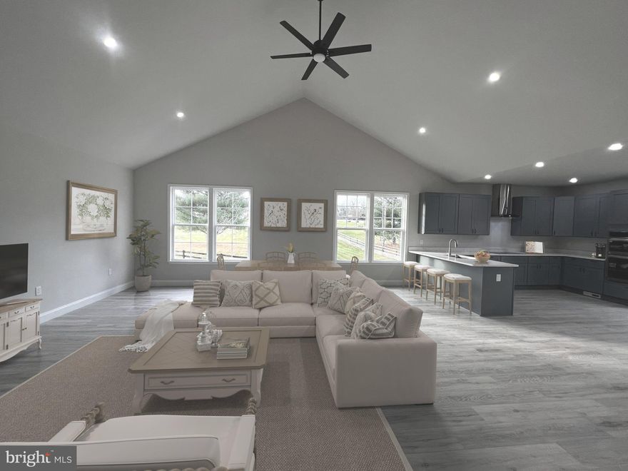 Move in Ready! This 4-bedroom, 3 bathroom  boasts an open floor plan that's perfect for modern living. As you step inside, you'll be greeted by a spacious living room that flows seamlessly into the dining room and kitchen. The kitchen is a chef's dream, with recessed lighting, quartz countertops, and stainless-steel appliances, including a dishwasher, built in microwave and oven, and refrigerator and lots of cabinets! The primary bedroom is generously sized and comes complete with a walk-in closet and a primary bathroom that features a double vanity and a stand-up shower. The lower level is fully finished and features two additional rooms and a full bathroom. This space is perfect for a home office, a playroom, game/entertainment area or an extra sleeping quarters for guests.