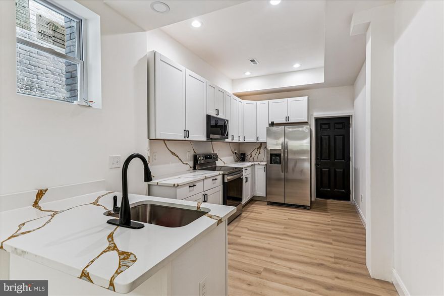 Welcome to 2611 E Preston St, Baltimore, MD 21213! This fully renovated 5-bedroom, 4-bath home is a must-see. The house is completely electric and features modern amenities throughout. For added peace of mind, the seller is including a paid home warranty.
The kitchen is a chef's dream with quartz countertops, Hampton Bay cabinets, and stainless-steel appliances, including a refrigerator. For ultimate convenience, the home has two sets of washer and dryer hookups, with a washer and dryer available in both the basement and the primary suite.
The home is equipped with a 4-ton HVAC system to keep you comfortable year-round. The primary bathroom offers a custom deep soaking tub, perfect for unwinding after a long day.
Located in Baltimore, this property provides easy access to some of the city's best attractions. Enjoy a day at the beautiful Patterson Park or take in a game at Oriole Park at Camden Yards or M&T Bank Stadium. You can also explore the vibrant shops and restaurants of Fells Point and Canton.
This house qualifies for the $5,000 Chase Homebuyer Grant. Check with your lender as this home may even qualify for additional Baltimore area grants. See the Maryland Mortgage Program, Block Grant, Live Baltimore, St. Ambrose Housing Aid Center, Chenoa & FHLB grants. Don't miss out, schedule your tour today!