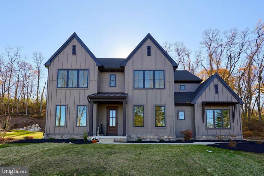 The Breckenridge home plan designed by Pine Hill Building Co. This home has 5 Bedrooms, 4 Baths,  3 Car Garage.  The 1st Floor includes: 10’ Ceilings, Flex Room/Bedroom, Full Bath, Home office, Kitchen with large Island, Walk-in Pantry, Drop Zone and Dining Area which leads to the vaulted Family Room. The 2nd Floor includes: 9’ Ceilings, Owners Suite, Jack & Jill Bedrooms/Bathroom, Secondary Bedroom Suite, and Laundry Room.  Optional Features include:  Wood beams in Vaulted Family Room, Tile fireplace, Bench with hooks in the drop zone, Metal Staircase Railing, Black Anderson Windows, Tray Ceilings with Stained Beams and a Glass & Tile Shower in Owner’s Suite, and other options to personalize the home to reflect the Pine Hill Building Co style.  The home sits on over an acre wooded lot and is conveniently located close to major highways and the Lebanon Rail-Trail. There is still time to make this home YOURS for the holidays!